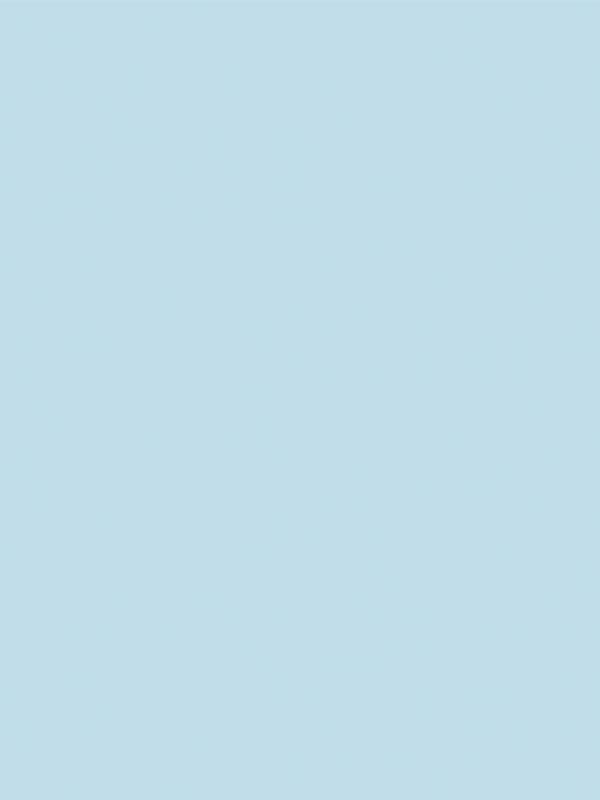 Solid color sample of light blue seamless photography backdrop paper for professional studio use.