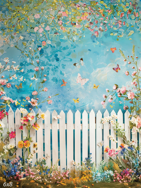 A vibrant spring floral backdrop featuring a white picket fence, colorful flowers, butterflies, and a blue sky.