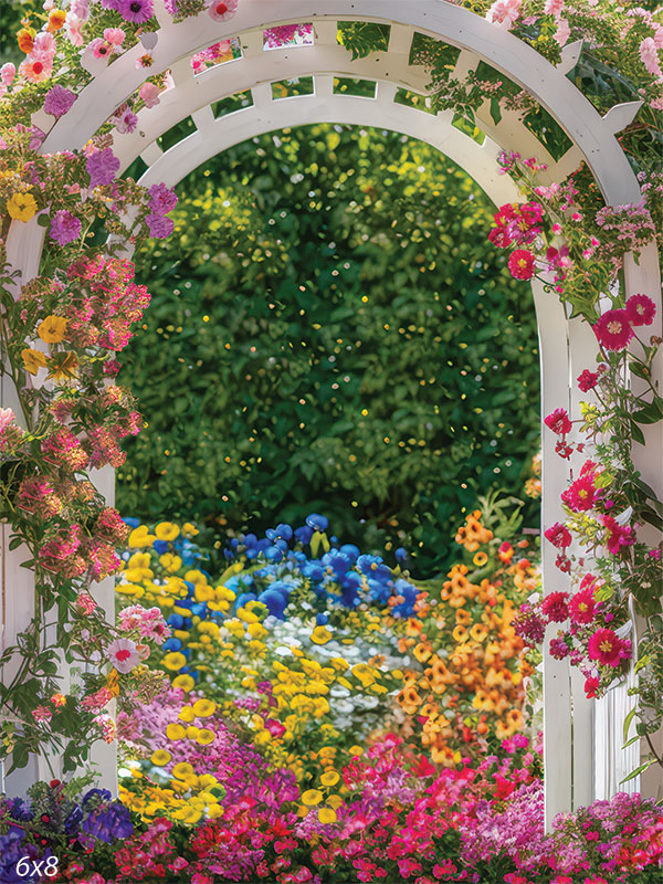 Colorful floral arch with vibrant spring blooms and lush greenery for Easter portraits.