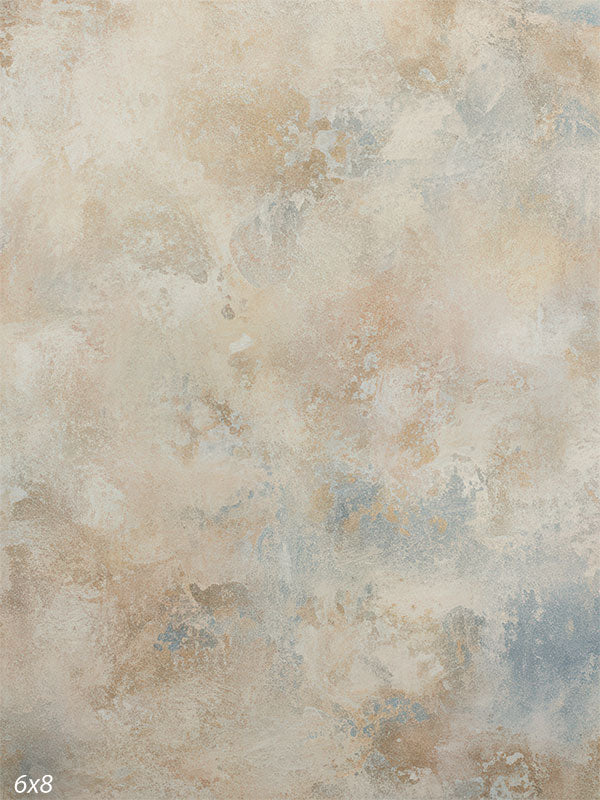 A softly weathered, painterly wall backdrop with warm tan, pale buff, and muted blue tones blended into an abstract, textured surface.