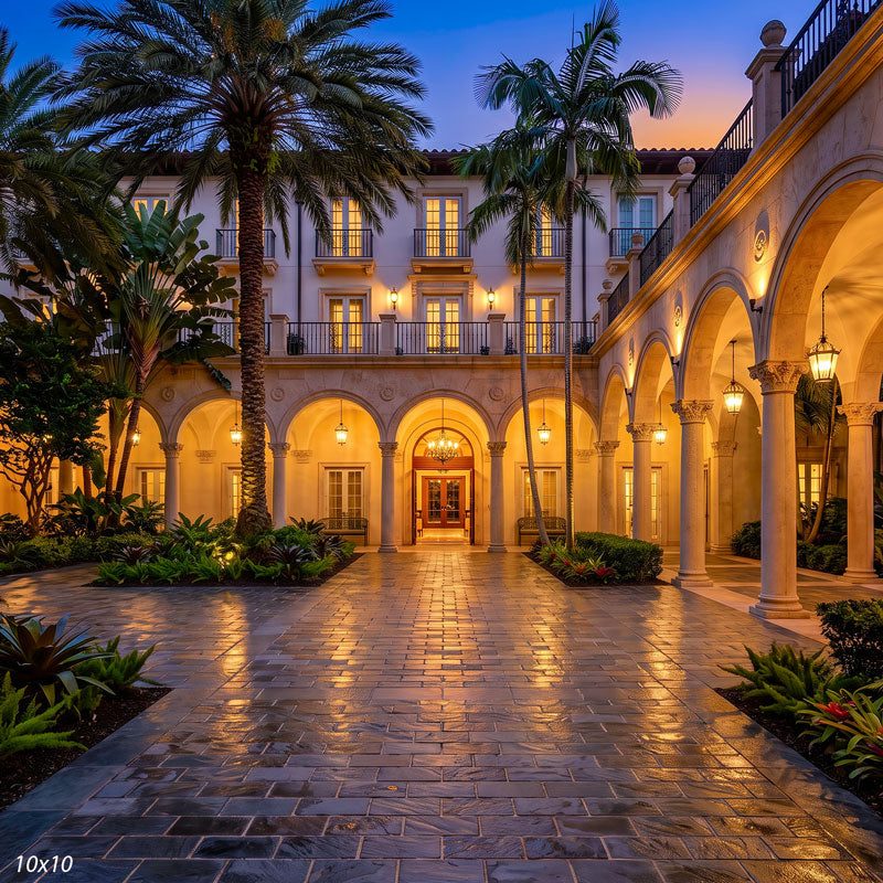 Wider view of the arched colonnade courtyard, showing more of the arcade and reflective plaza, a scenic photography backdrop.