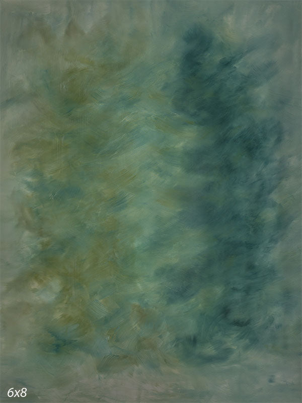 Green hand-painted photography backdrop with teal and olive brushwork drifting in soft directional movement for studio portraits.