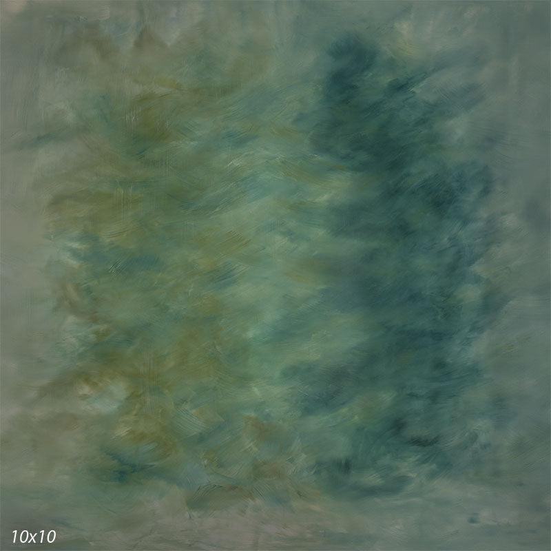 Green hand-painted photography backdrop with teal and olive brushwork drifting in soft directional movement for studio portraits.