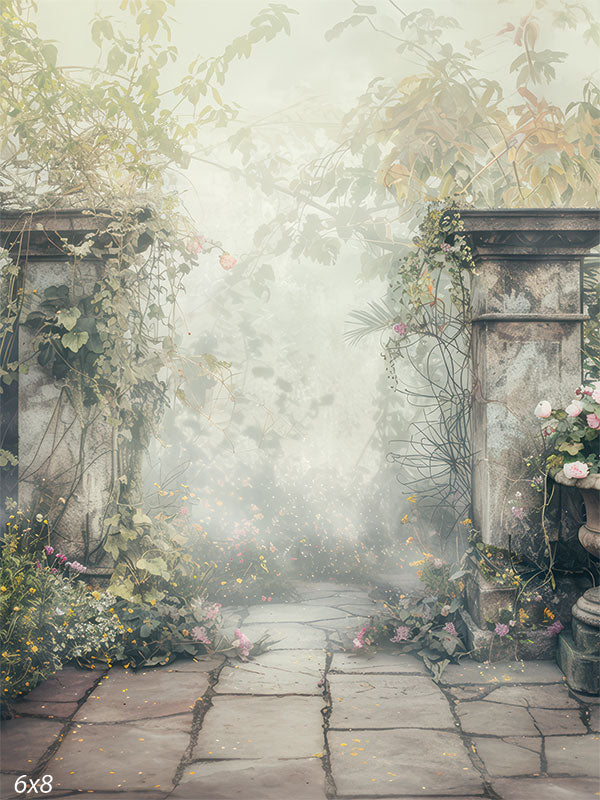 Rustic garden backdrop featuring overgrown foliage, stone columns, and a misty ambiance for professional photoshoots.