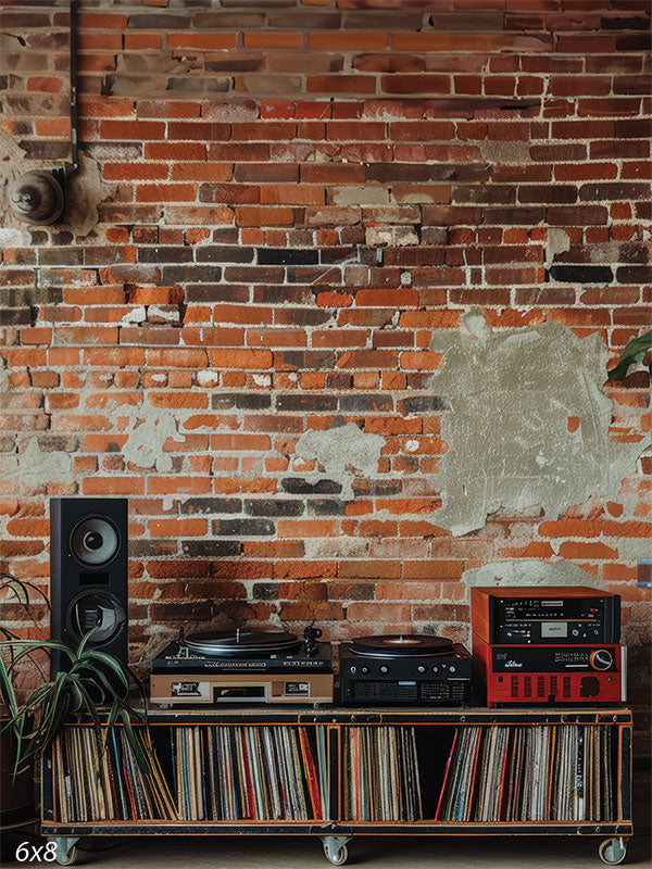 Vintage Exposed Brick Music Studio Backdrop - Vintage exposed brick wall with vinyl record player setup, ideal for music-themed photoshoots and industrial-style photography backdrops.