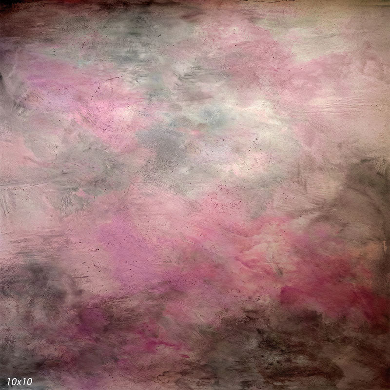 Printed studio background showing a painterly mottled dusty rose texture with a lighter center that deepens toward the edges.