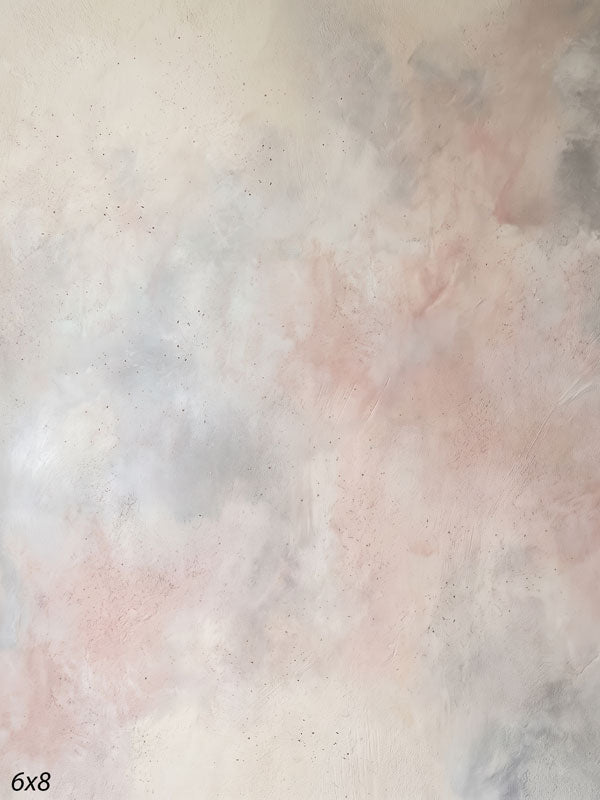 Printed photography backdrop showing pale gray-cream with faint pastel hints, a soft mottled painterly texture with gentle tonal movement.