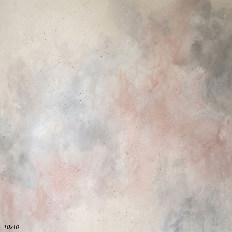Printed studio background showing a painterly mottled pale gray texture with a lighter center that deepens toward the edges.