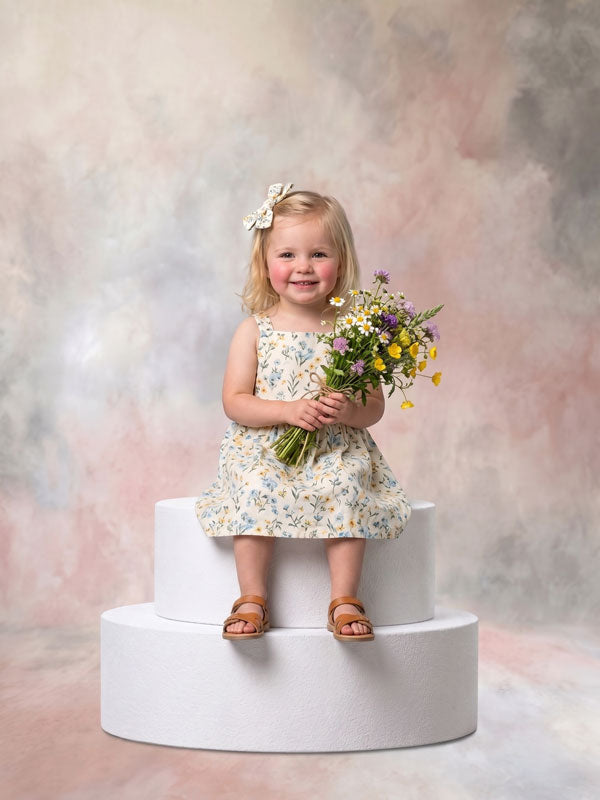Whisper Veil pale gray texture photography backdrop shown behind a toddler girl holding wildflowers CP-8994