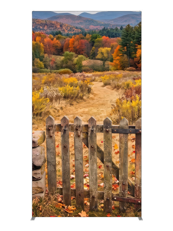 Weathered wooden gate opening to a golden autumn mountain meadow with a blazing tree line, 4ft photography backdrop panel for Denny StudioEdge silicone edge frame