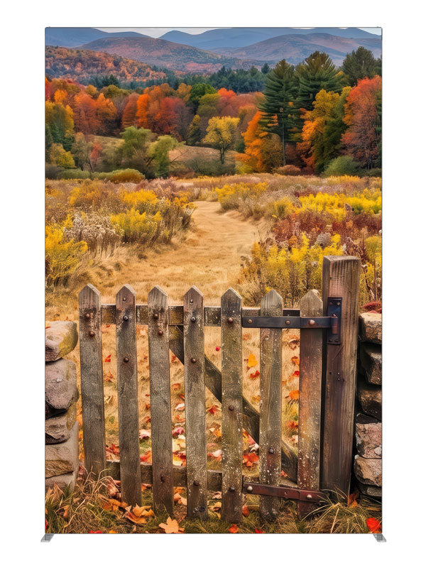 Weathered wooden gate opening to a golden autumn mountain meadow with a blazing tree line, 5ft photography backdrop panel for Denny StudioEdge silicone edge frame