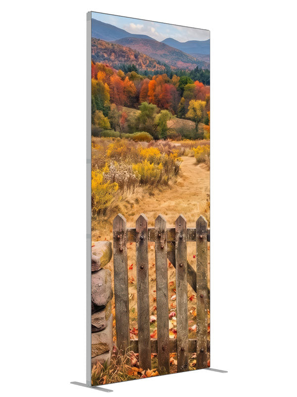 Weathered wooden gate opening to a golden autumn mountain meadow with a blazing tree line, 3ft photography backdrop panel for Denny StudioEdge silicone edge frame, angled view