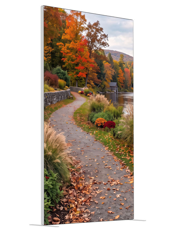 Curving riverside path along a low stone wall beneath peak autumn trees, 4ft photography backdrop panel for Denny StudioEdge silicone edge frame, angled view