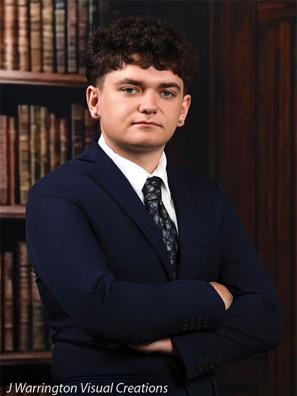 Benedict dark wood library bookcase photography backdrop shown with a senior in a navy suit with arms crossed in a poised portrait CP-8839