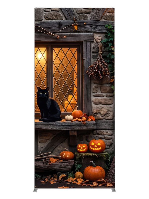 Two black cats on a glowing leaded cottage window in a stone-and-timber wall with jack-o'-lanterns, 3ft photography backdrop panel for Denny StudioEdge silicone edge frame