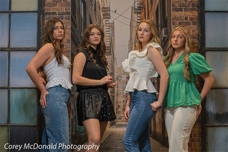 Brenner Brick Warehouse Windows, photography backdrop panel for Denny StudioEdge silicone edge frame, shown with four senior girls posed with hands on hips in the painted alley SECP-8865