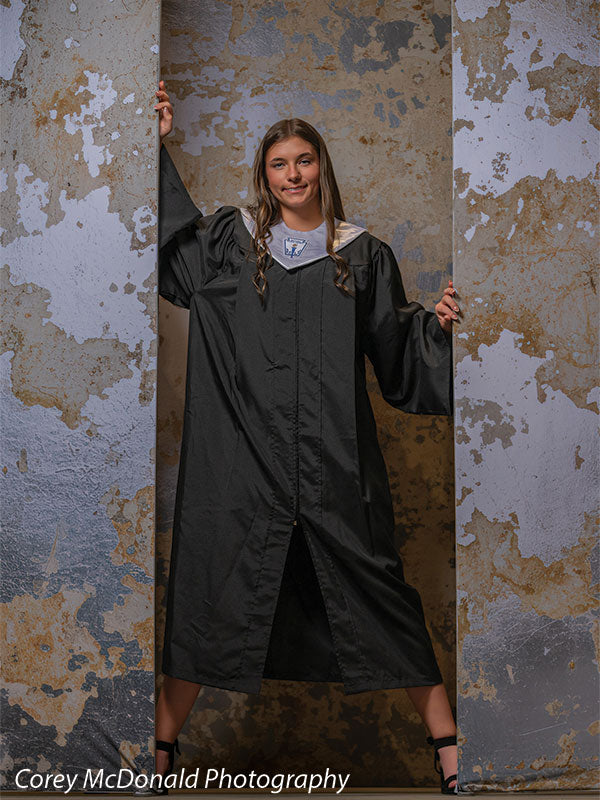 Caspian Silver and Beige Weathered Texture, photography backdrop panel for Denny StudioEdge silicone edge frame, shown with a senior girl in a black graduation gown posing with an arm raised, full-length SECP-8856