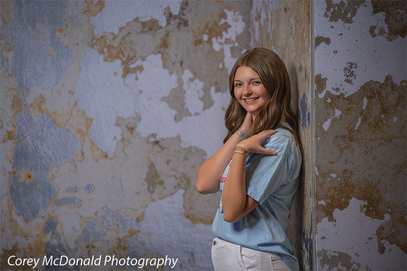 Caspian Silver and Beige Weathered Texture, photography backdrop panel for Denny StudioEdge silicone edge frame, shown with a senior girl smiling with a hand at her shoulder SECP-8856