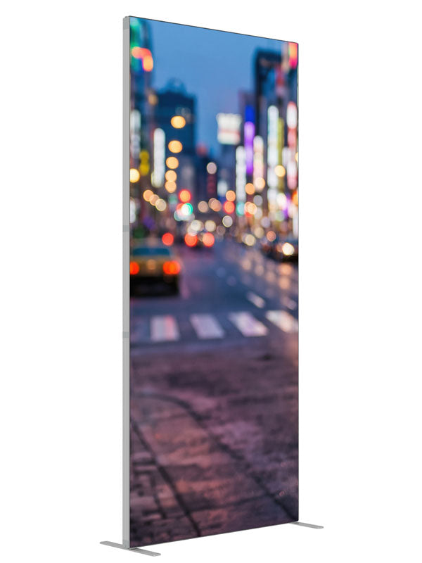A city street at dusk blurred into multicolored out-of-focus light orbs over a reflective road, 3ft photography backdrop panel for Denny StudioEdge silicone edge frame, angled view