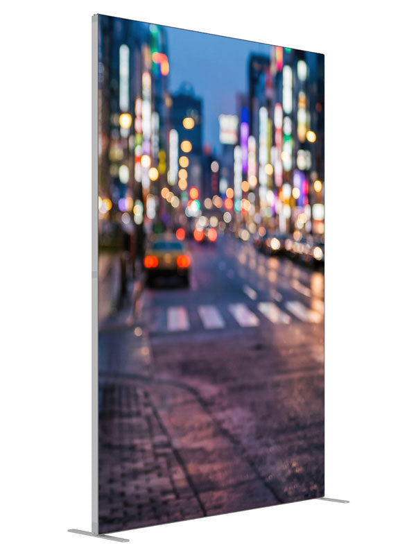 A city street at dusk blurred into multicolored out-of-focus light orbs over a reflective road, 5ft photography backdrop panel for Denny StudioEdge silicone edge frame, angled view