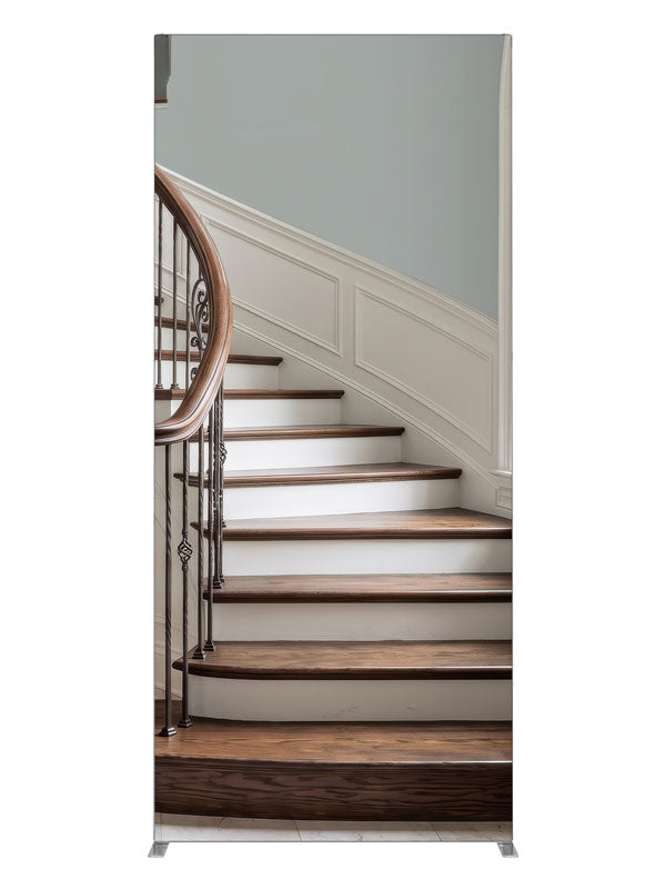 A light curved staircase with iron scroll balusters, white wainscot and a tall arched window, 3ft photography backdrop panel for Denny StudioEdge silicone edge frame