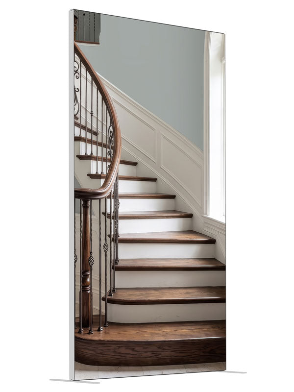 A light curved staircase with iron scroll balusters, white wainscot and a tall arched window, 4ft photography backdrop panel for Denny StudioEdge silicone edge frame, angled view
