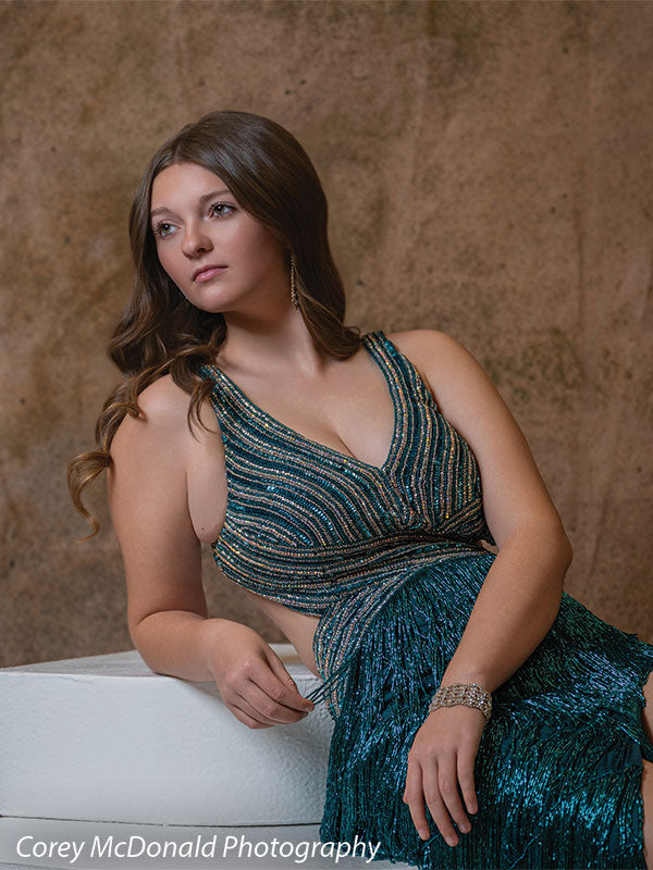 Corner Steps posing prop shown with a senior girl in a teal fringe gown leaning on the white foam corner steps in a vertical portrait Cor-Step
