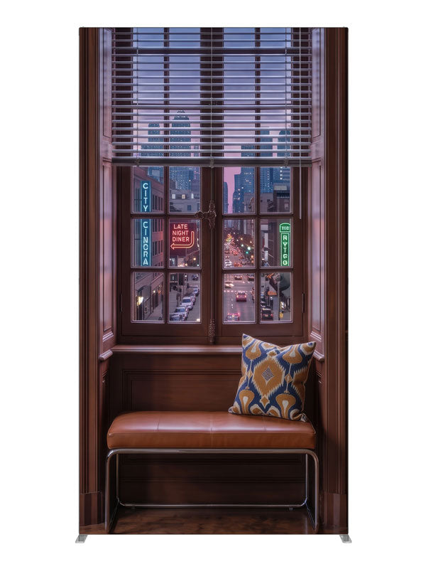 A warm wood-paneled room with a tall window overlooking a neon-lit downtown street at dusk, 4ft photography backdrop panel for Denny StudioEdge silicone edge frame