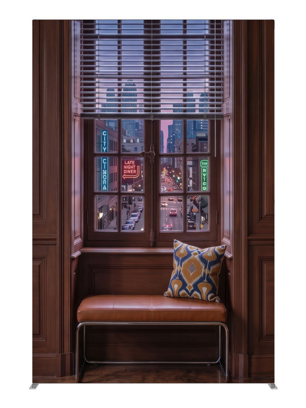 A warm wood-paneled room with a tall window overlooking a neon-lit downtown street at dusk, 5ft photography backdrop panel for Denny StudioEdge silicone edge frame