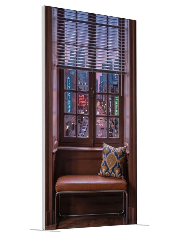 A warm wood-paneled room with a tall window overlooking a neon-lit downtown street at dusk, 4ft photography backdrop panel for Denny StudioEdge silicone edge frame, angled view