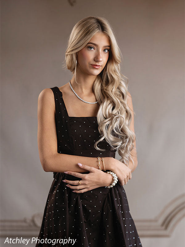 Elegant French panel wall photography backdrop shown with a senior girl in a black dress with a hand at her waist CP-8744