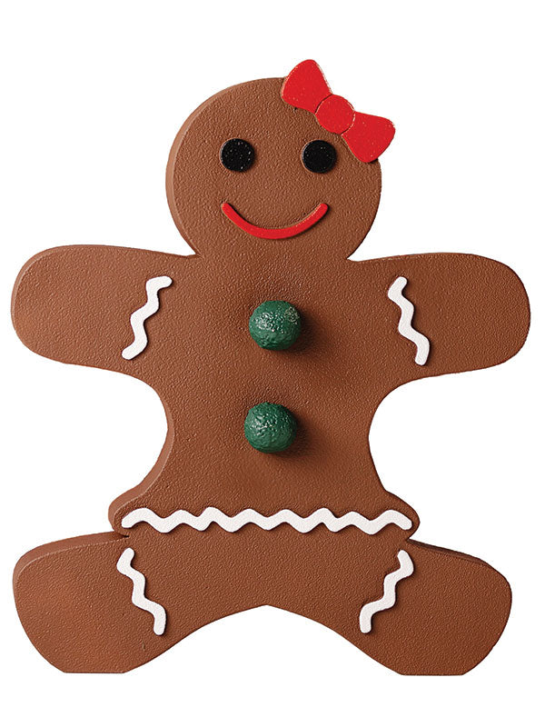 Brown gingerbread woman photo prop with a red bow, black eyes, red smile, green buttons, and white icing details on the arms and legs against a light gray background.