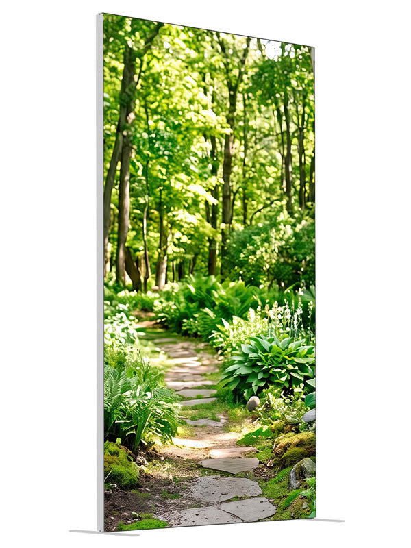 Flagstone path winding through a sunlit green woodland of ferns, hostas and slender trunks, 4ft photography backdrop panel for Denny StudioEdge silicone edge frame, angled view