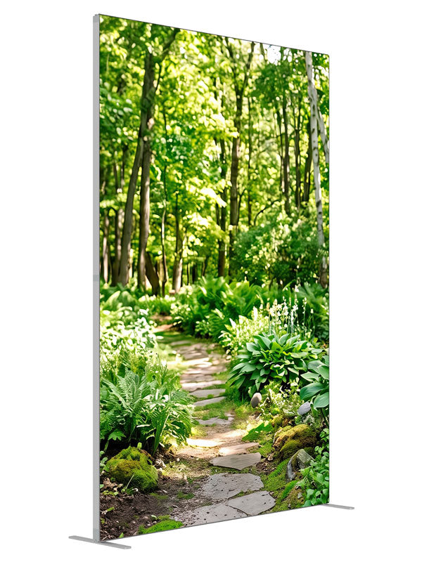 Flagstone path winding through a sunlit green woodland of ferns, hostas and slender trunks, 5ft photography backdrop panel for Denny StudioEdge silicone edge frame, angled view
