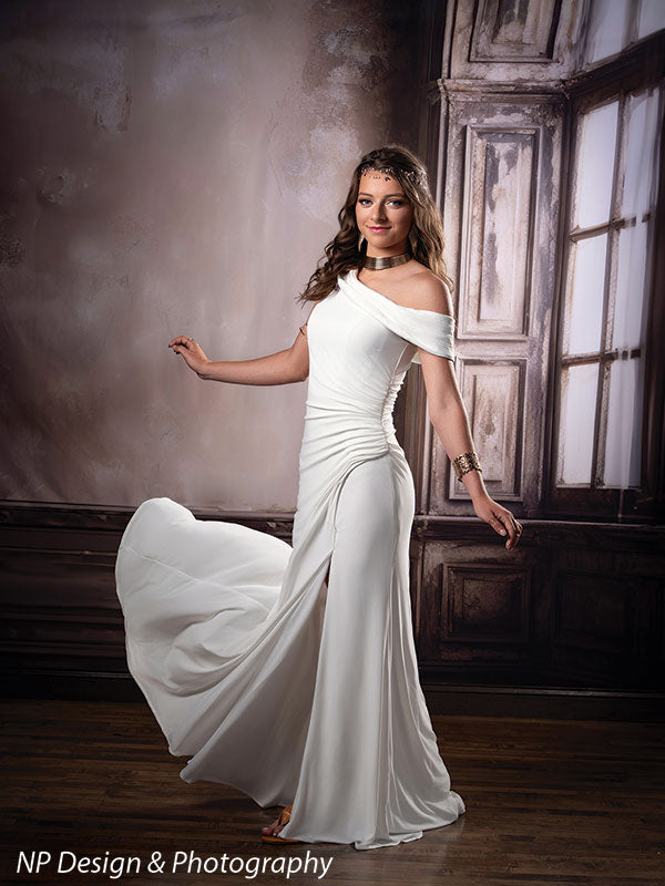 French beige foyer photography backdrop shown with a young woman in a flowing white gown with one hand extended CP-8500