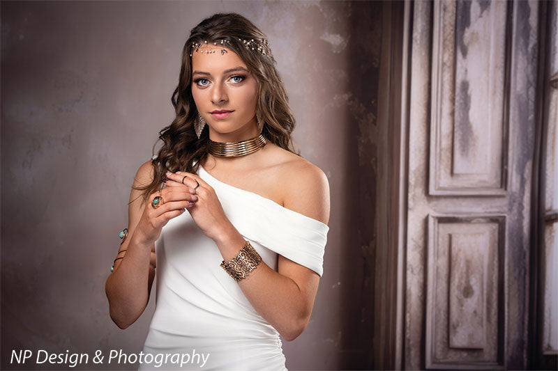 French beige foyer photography backdrop shown with a young woman in a white gown with her hand to her chest CP-8500