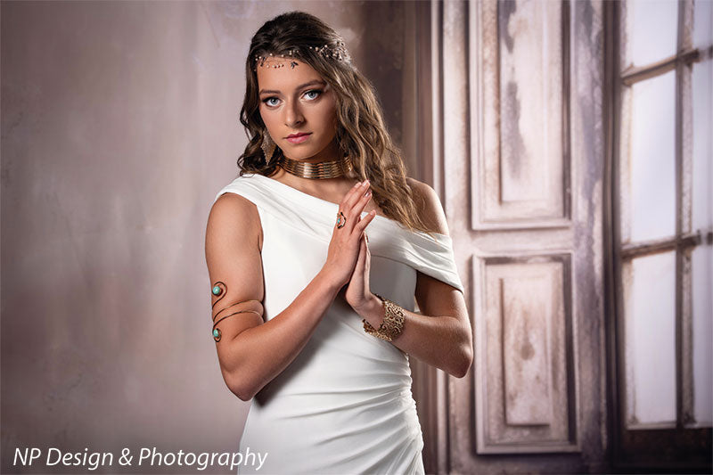 French beige foyer photography backdrop shown with a young woman in a white gown with a gold headpiece in a prayer-hands pose CP-8500