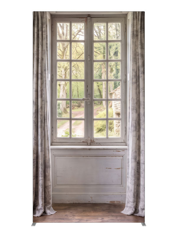A pale blue-gray French country room with a window onto a spring garden and stone cottage, 4ft photography backdrop panel for Denny StudioEdge silicone edge frame