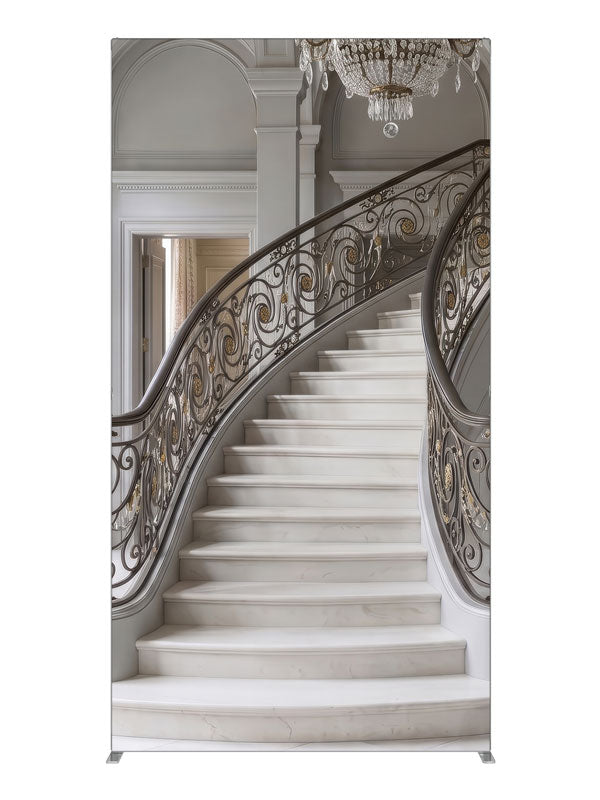 A grand curved gray marble staircase with bronze-and-gold iron railings and a crystal chandelier, 4ft photography backdrop panel for Denny StudioEdge silicone edge frame