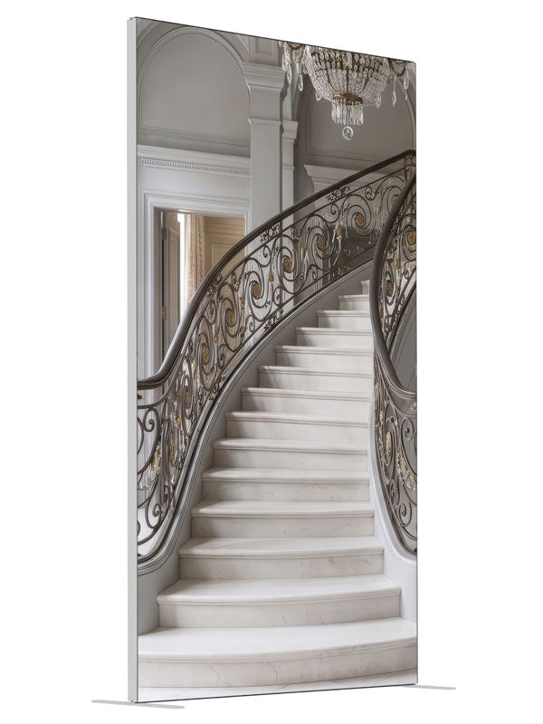 A grand curved gray marble staircase with bronze-and-gold iron railings and a crystal chandelier, 4ft photography backdrop panel for Denny StudioEdge silicone edge frame, angled view