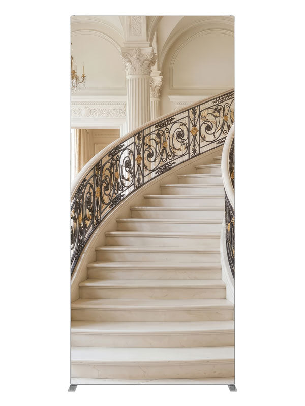 A palatial ivory marble curved staircase with black-and-gold iron railings in a vaulted neoclassical hall, 3ft photography backdrop panel for Denny StudioEdge silicone edge frame