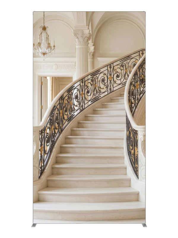 A palatial ivory marble curved staircase with black-and-gold iron railings in a vaulted neoclassical hall, 4ft photography backdrop panel for Denny StudioEdge silicone edge frame