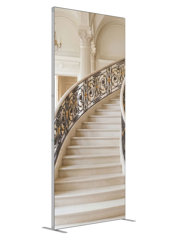A palatial ivory marble curved staircase with black-and-gold iron railings in a vaulted neoclassical hall, 3ft photography backdrop panel for Denny StudioEdge silicone edge frame, angled view