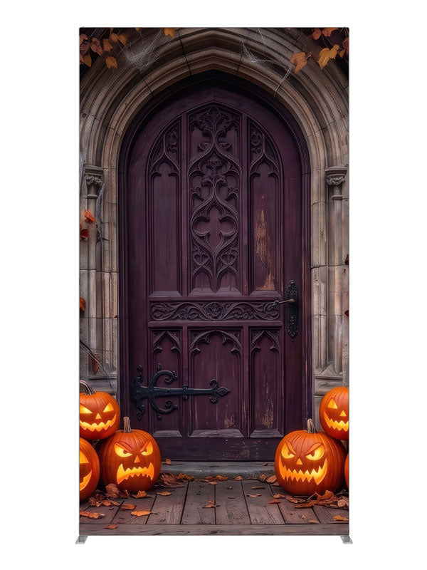 Cobwebbed Gothic arched door in weathered stone with glowing jack-o'-lanterns at the base, 4ft photography backdrop panel for Denny StudioEdge silicone edge frame