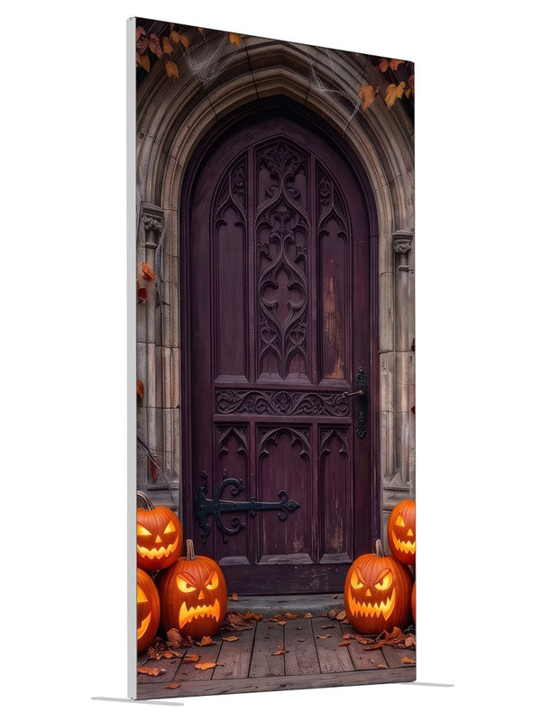 Cobwebbed Gothic arched door in weathered stone with glowing jack-o'-lanterns at the base, 4ft photography backdrop panel for Denny StudioEdge silicone edge frame, angled view