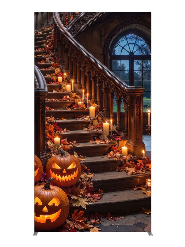 Ornate curved manor staircase dressed with glowing jack-o'-lanterns, candles, and autumn leaves, 4ft photography backdrop panel for Denny StudioEdge silicone edge frame