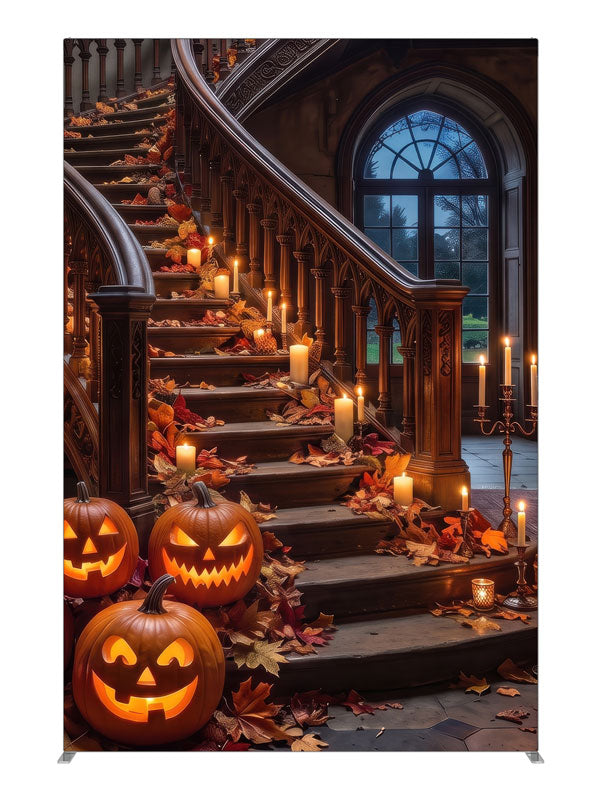 Ornate curved manor staircase dressed with glowing jack-o'-lanterns, candles, and autumn leaves, 5ft photography backdrop panel for Denny StudioEdge silicone edge frame