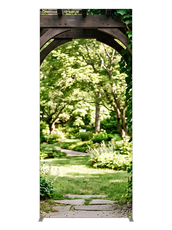 Dark timber and dry-stacked stone garden arbor under heavy ivy opening onto a sunlit lawn, 3ft photography backdrop panel for Denny StudioEdge silicone edge frame