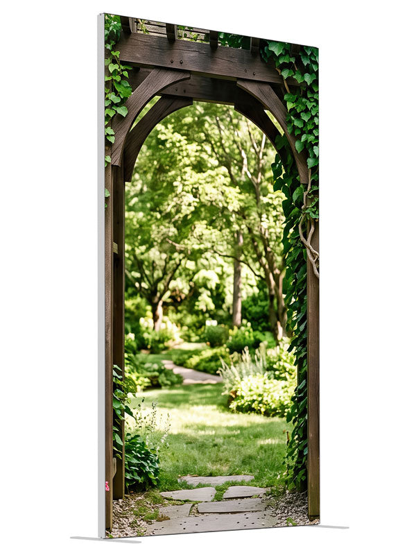Dark timber and dry-stacked stone garden arbor under heavy ivy opening onto a sunlit lawn, 4ft photography backdrop panel for Denny StudioEdge silicone edge frame, angled view
