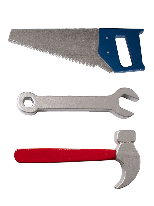 Flat lay of silver and red toy hammer, silver wrench, and silver and blue saw styled as children’s construction props for themed studio photography sessions.